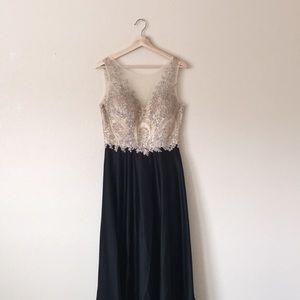 Black and gold full length prom dress with mesh